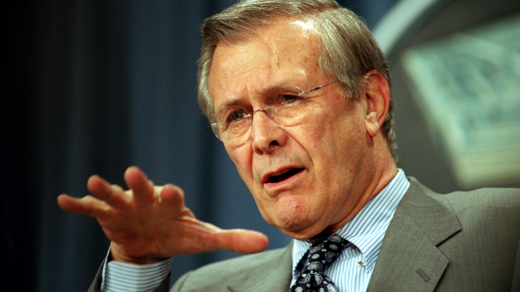 020221-D-9880W-080
	Secretary of Defense Donald H. Rumsfeld briefs reporters at the Pentagon on the latest developments in the war on terrorism on Feb. 21, 2002.   Rumsfeld and Chairman of the Joint Chiefs of Staff Gen. Richard B. Myers, U.S. Air Force, provided details of the Jan. 23, 2002, U.S. ground assault on two buildings in the Afghan village of Hazar Qadam.  DoD photo by R. D. Ward.  (Released)
